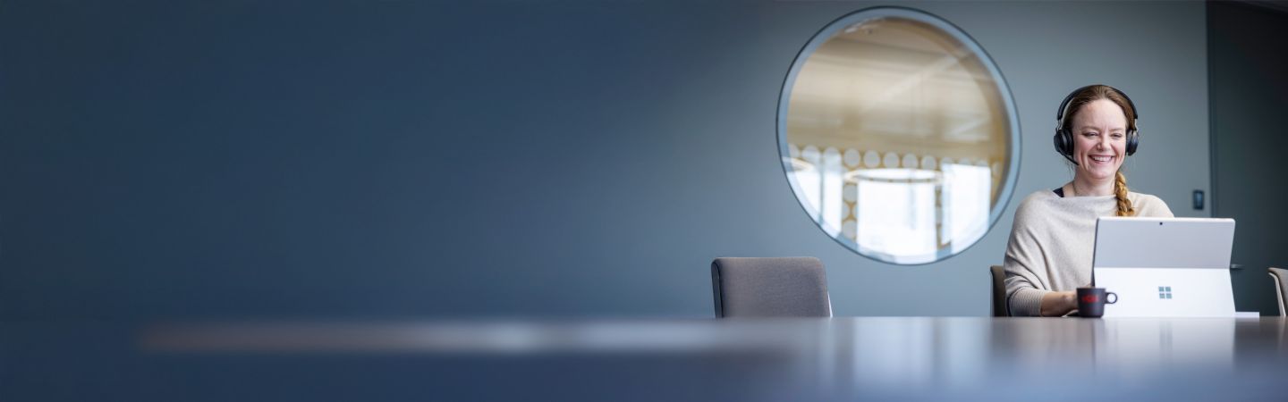 Focused EOS employee in a modern workspace